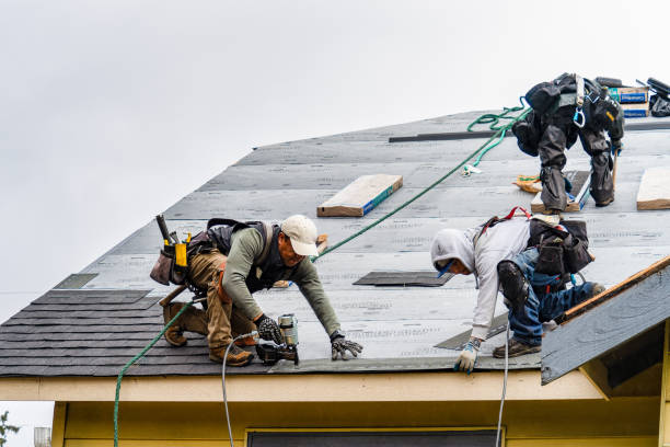 Professional Roofing technician working in Oak Island, NC